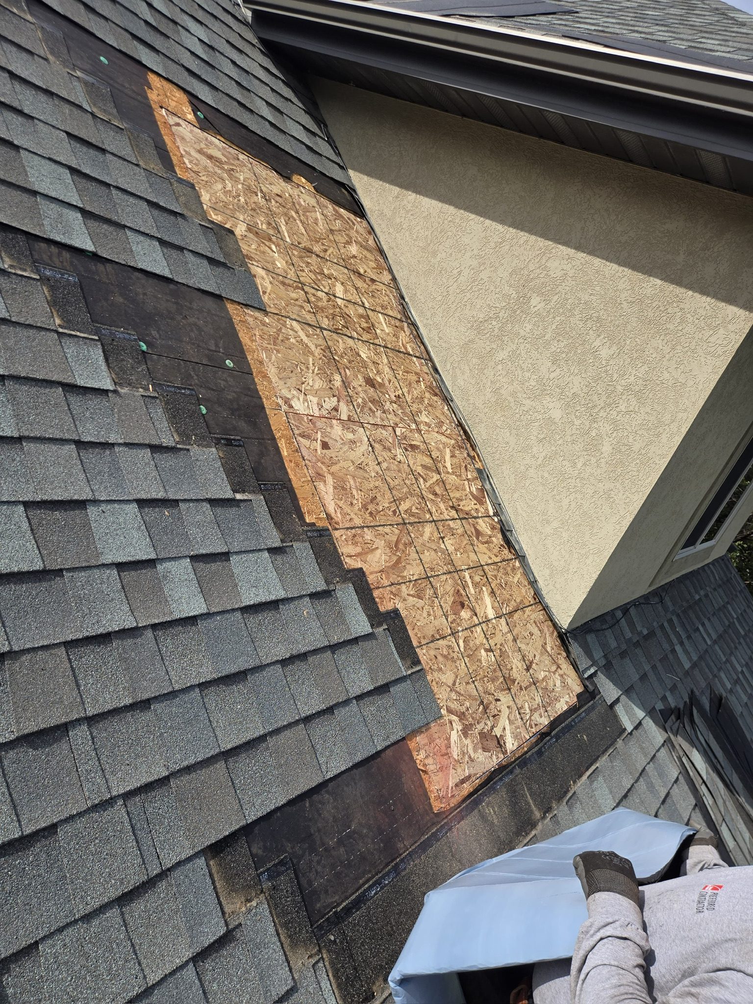 Damaged sheathing, replaced before the new roof