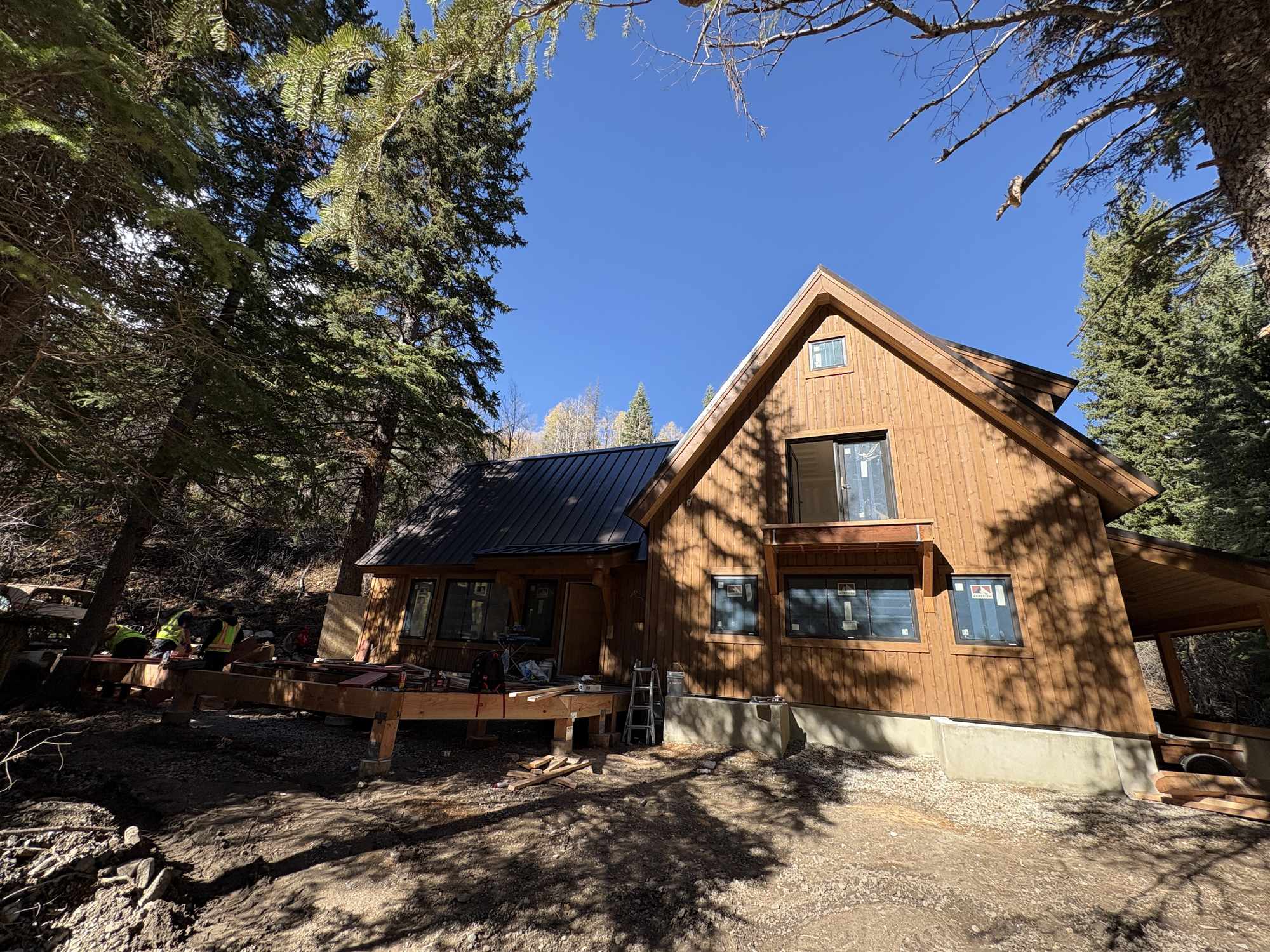 Cabin re-roof in the trees, Sundance