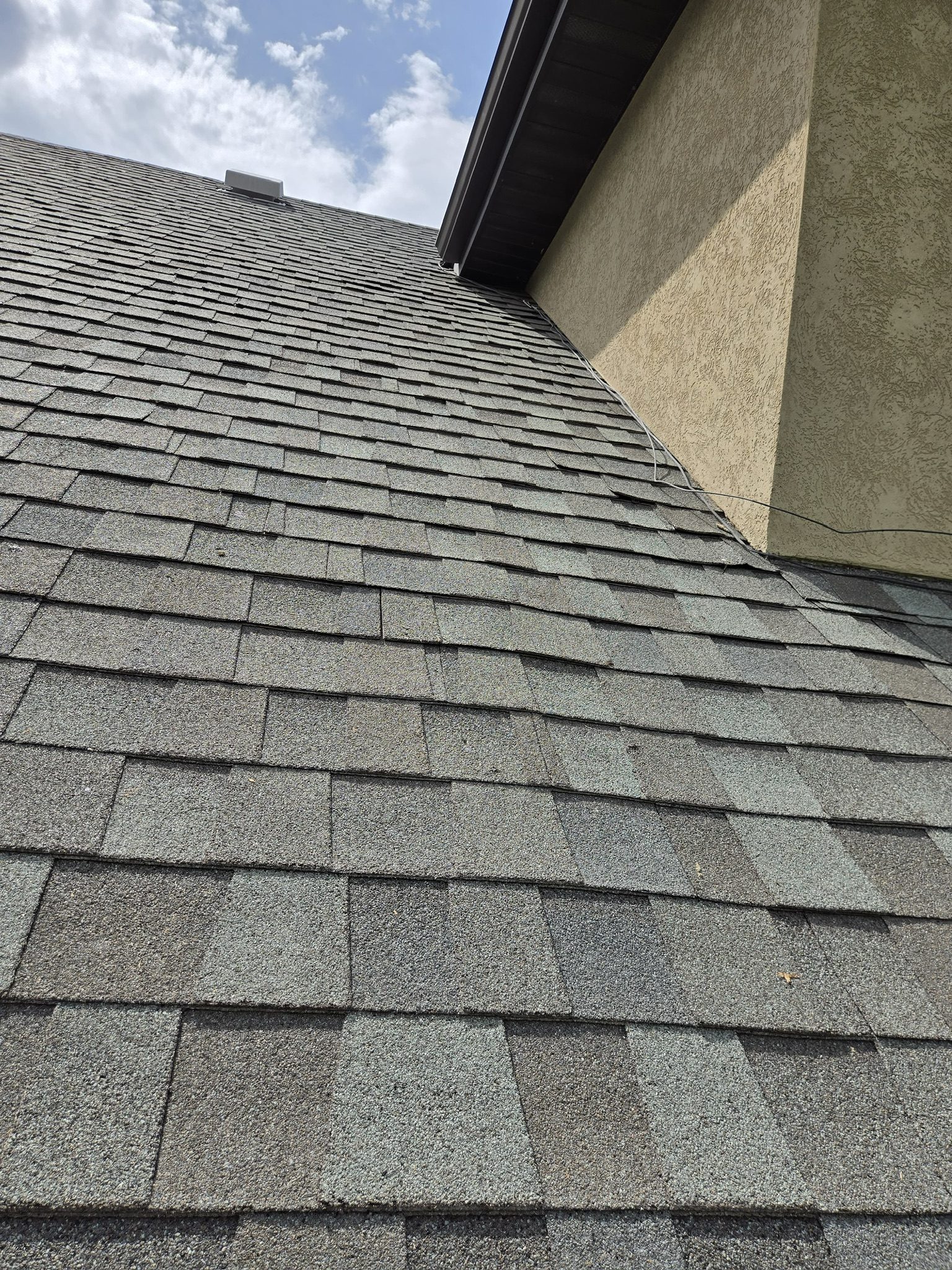Failed shingles at close range